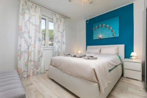 Two-bedroom app 'Castegner' with garden & free parking
